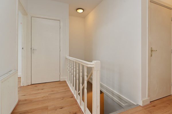 Medium property photo - Deimanstraat 309, 2522 BK Den Haag